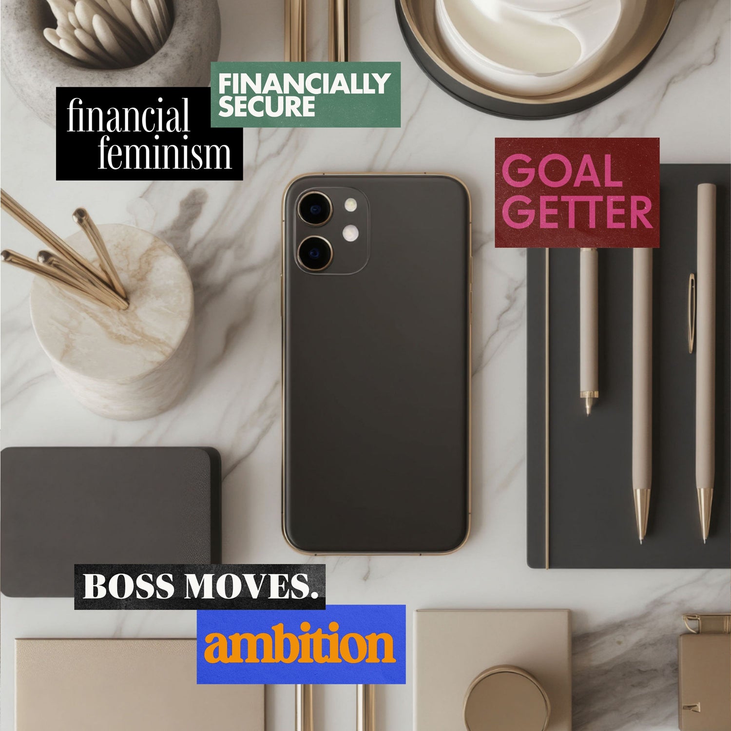 Styled workspace with phone, notebook, and pens representing financial empowerment, career ambition, and success mindset.