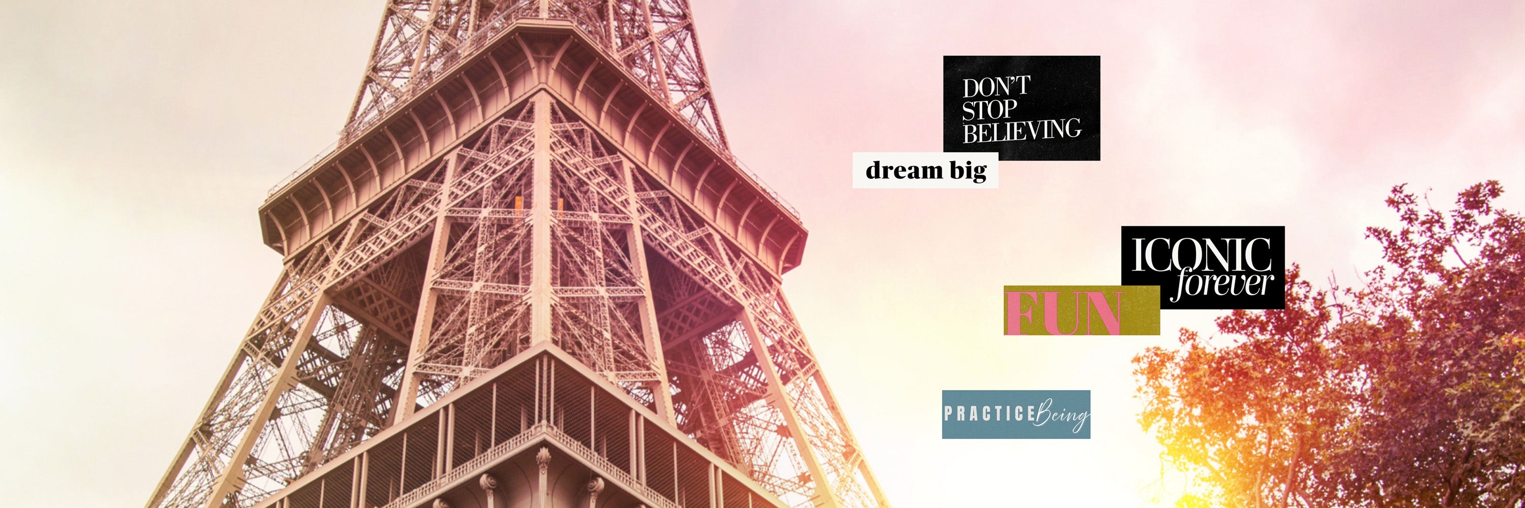 Wide view of Eiffel Tower with motivational phrases about dreaming big and believing, representing travel goals and luxury vision board inspiration.