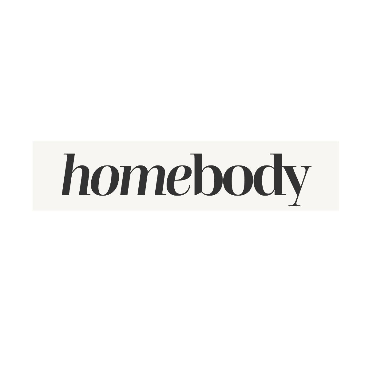 Minimal typographic word art displaying the word homebody, representing comfort, coziness, and a love for staying in and creating a meaningful home life.